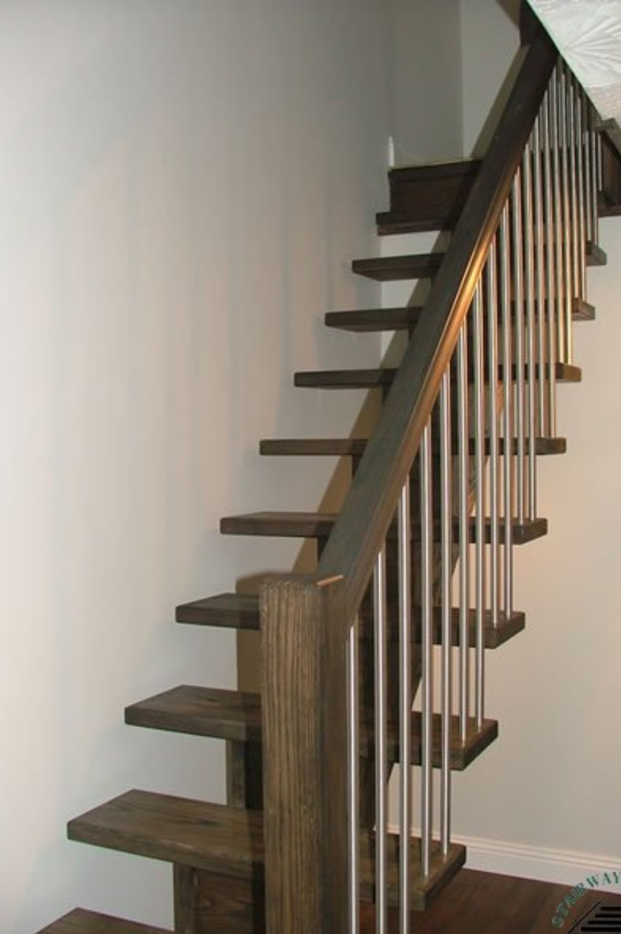Straight Cut string stairs with metal balusters
