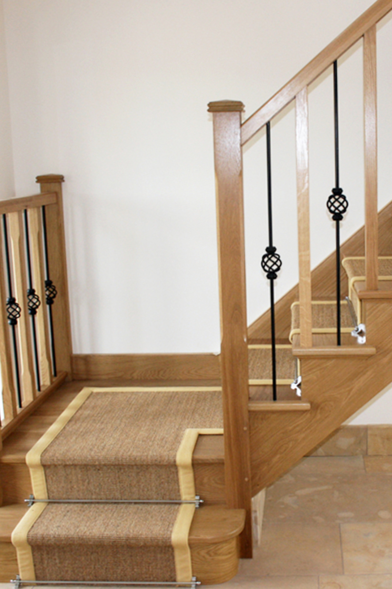 Cut string L-bent stairs with iron baluster