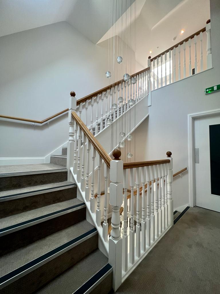 White baluster commercial staircase