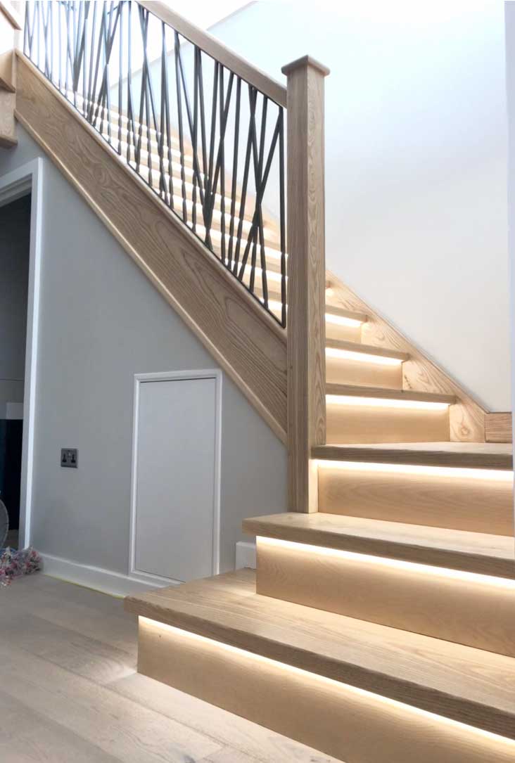 Modern Staircase with metal spindles