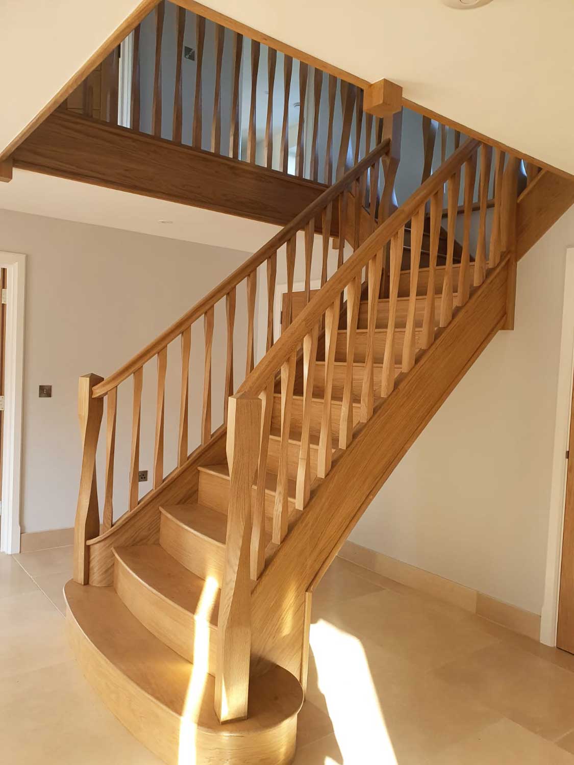 split wooden staircase with Timber Spindles