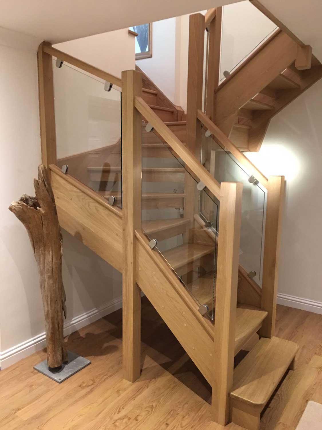 split Open Riser staircase with glass balusters