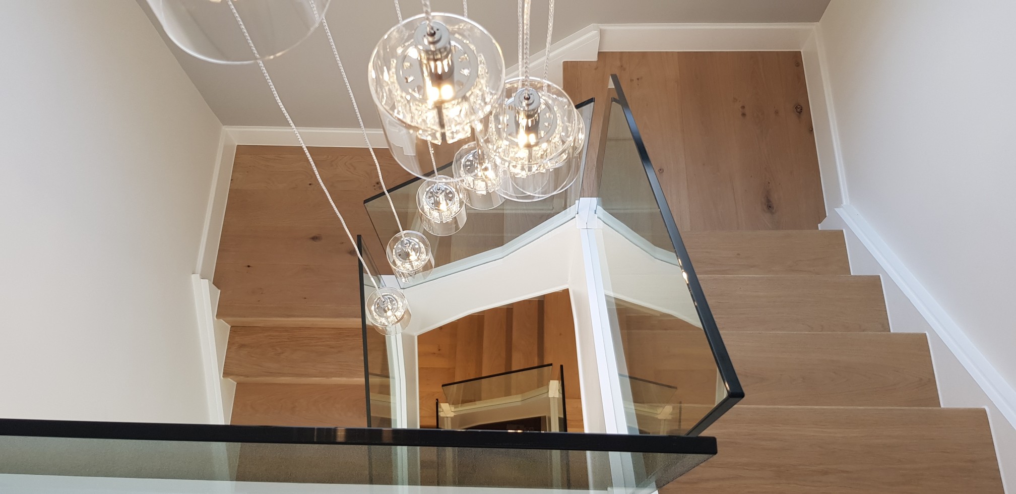 Spiral staircase with glass balusters