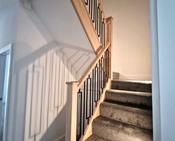 Staircase with square metal spindles
